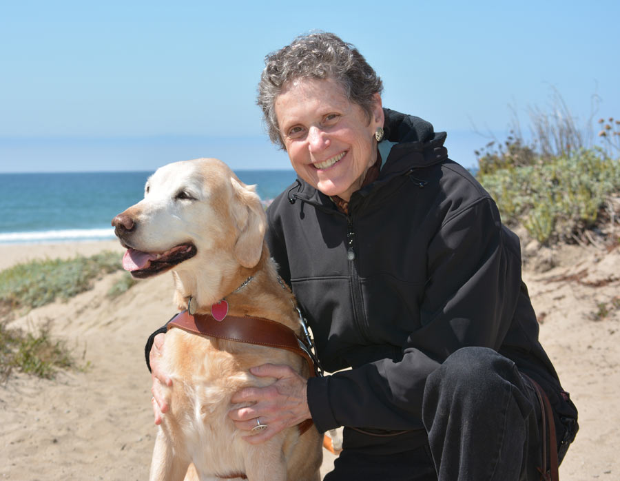 Photo of author and Teela happy together on beach