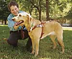Photo of the author with her guide dog.